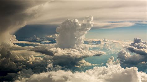 How's the Weather Going to Be Tomorrow, and Why Do Clouds Sometimes Look Like Unfinished Paintings?